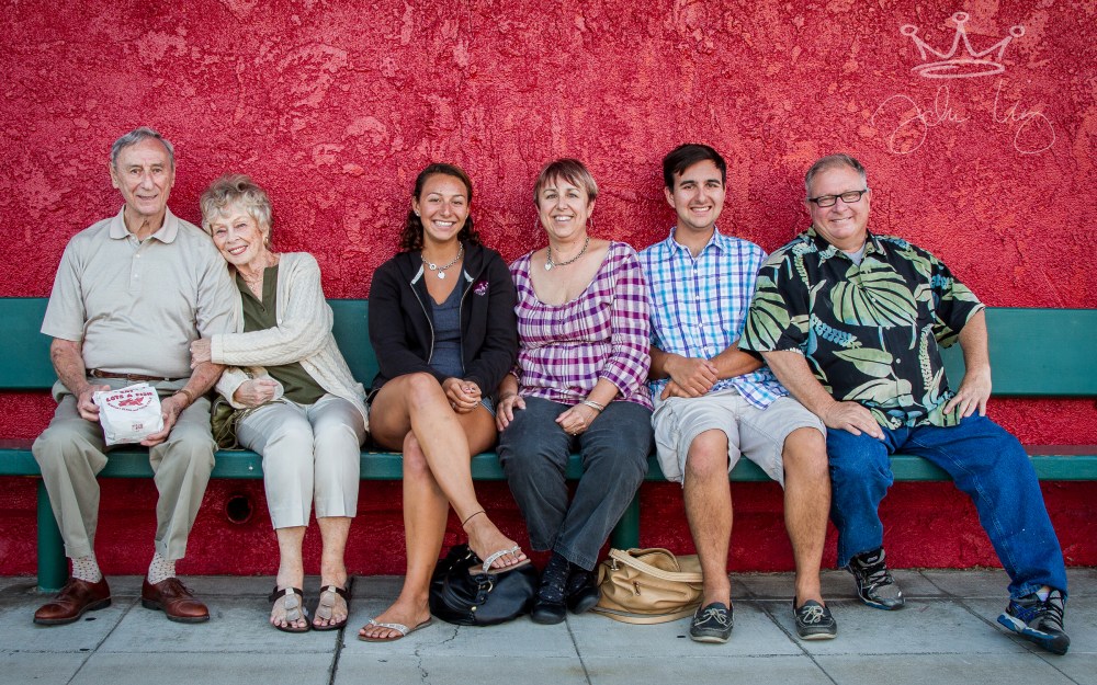 I just loved the contrast of this amazing red wall against this wonderful family...  Truly great fun!  